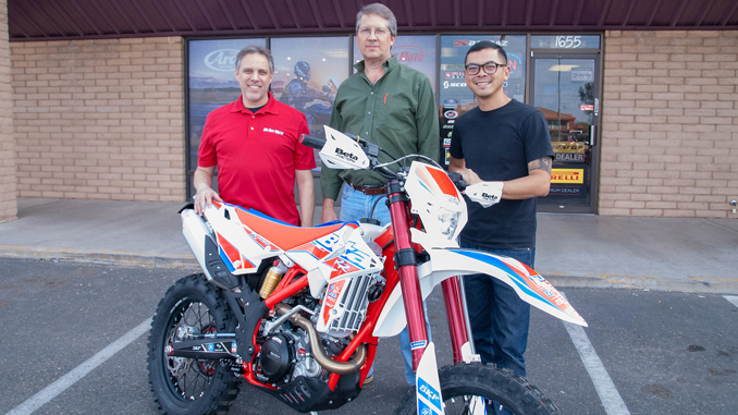 L-R - On Any Moto Owner Michael Battaglia - grand prize winner Cliff Reed - Beta Motorcycle -On Any Moto Sales Manager James Bautista