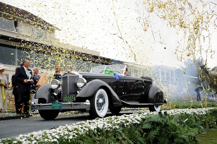 1934 Packard Twelve Individual Custom Convertible Victoria wins Best of Show at the 2013 Pebble Beach Concours d’Elegance (Credit – Eugene Robertson © 2013 Courtesy of RM Sotheby’s).