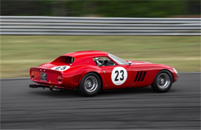 RM Sotheby's - Monterey - The Ferrari 250 GTO on the track with its current owner at the wheel