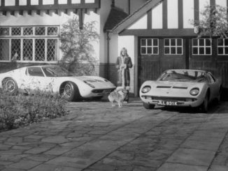 Rod Stewart’s girlfriend poses with his Lamborghini Miuras outside his home in Southgate in 1970 - RM Sothebys London Auction
