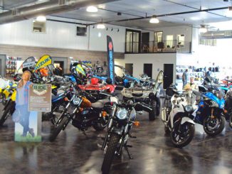 Demo Ride - Suzuki motorcycle on display in Rice's Rushmore Motorsports new showroom. Photo by Terry Hoyt.