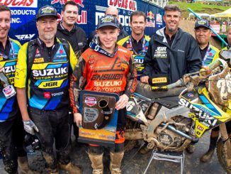 Alex Martin (#26) stands at the podium second overall with the JGRMX-Yoshimura Suzuki Factory Racing Team crew