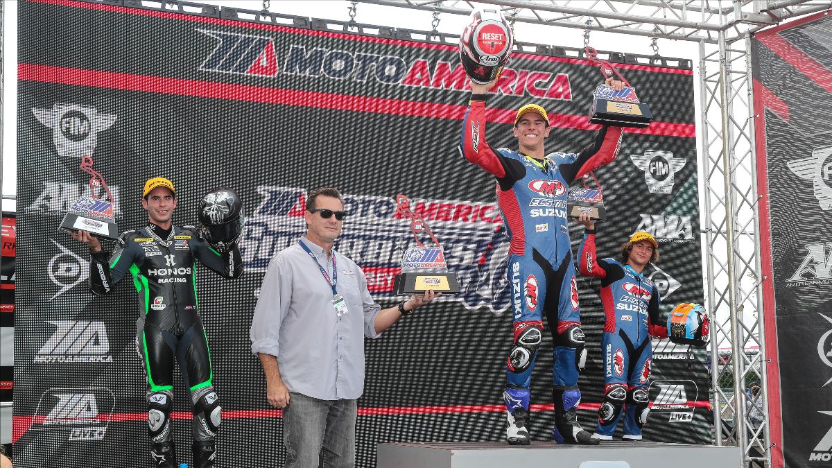 210912 Sean Dylan Kelly (center) celebrates his 11th Supersport victory of the season with Richie Escalante (left) and Sam Lochoff (right)