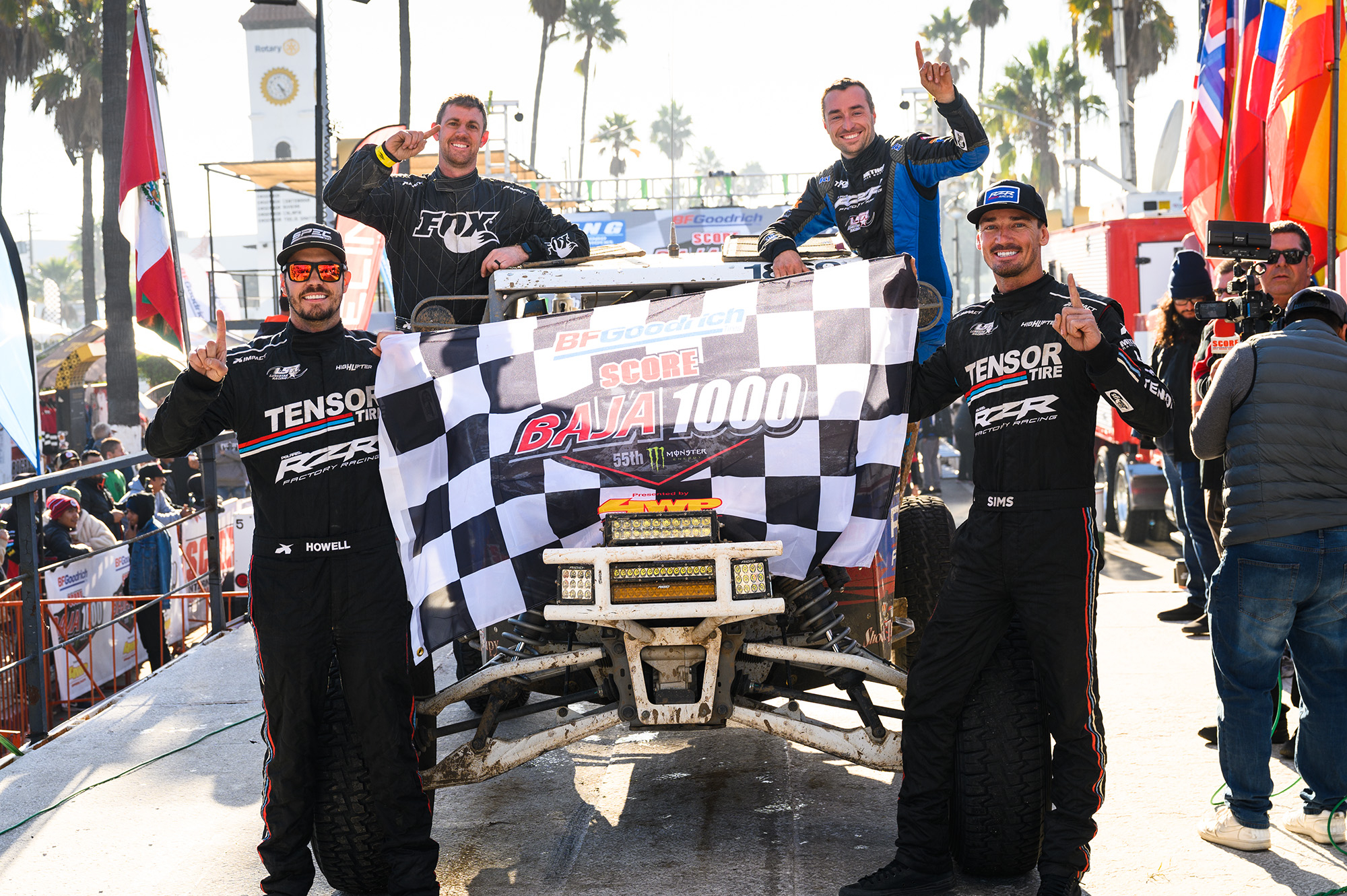 Polaris RZR Factory Racing's Branden Sims and co-driver Eric Borgen Celebrate their 2022 SCORE Baja 1000 victory