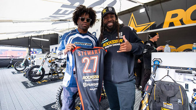 Kenny Moore II visiting with Malcolm Stewart at Round 13 at Gillette Stadium in Foxborough, Mass. last year [678]