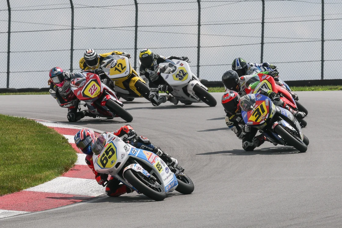 Pole sitter Paige (65) leads Vossberg (31), Di Mario (hidden), Drane (hidden), Ella Dreher (22), King (32) and Kody Kopp (12)